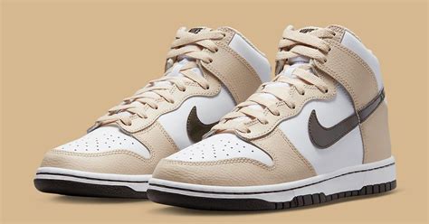 nike dunks beige and white.